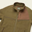 A brown polyester fleece jacket with a front zipper, high collar, and a chest pocket featuring a contrasting panel. The soft and fluffy texture adds comfort, while the label inside reads Howler Bros Howler Crozet.