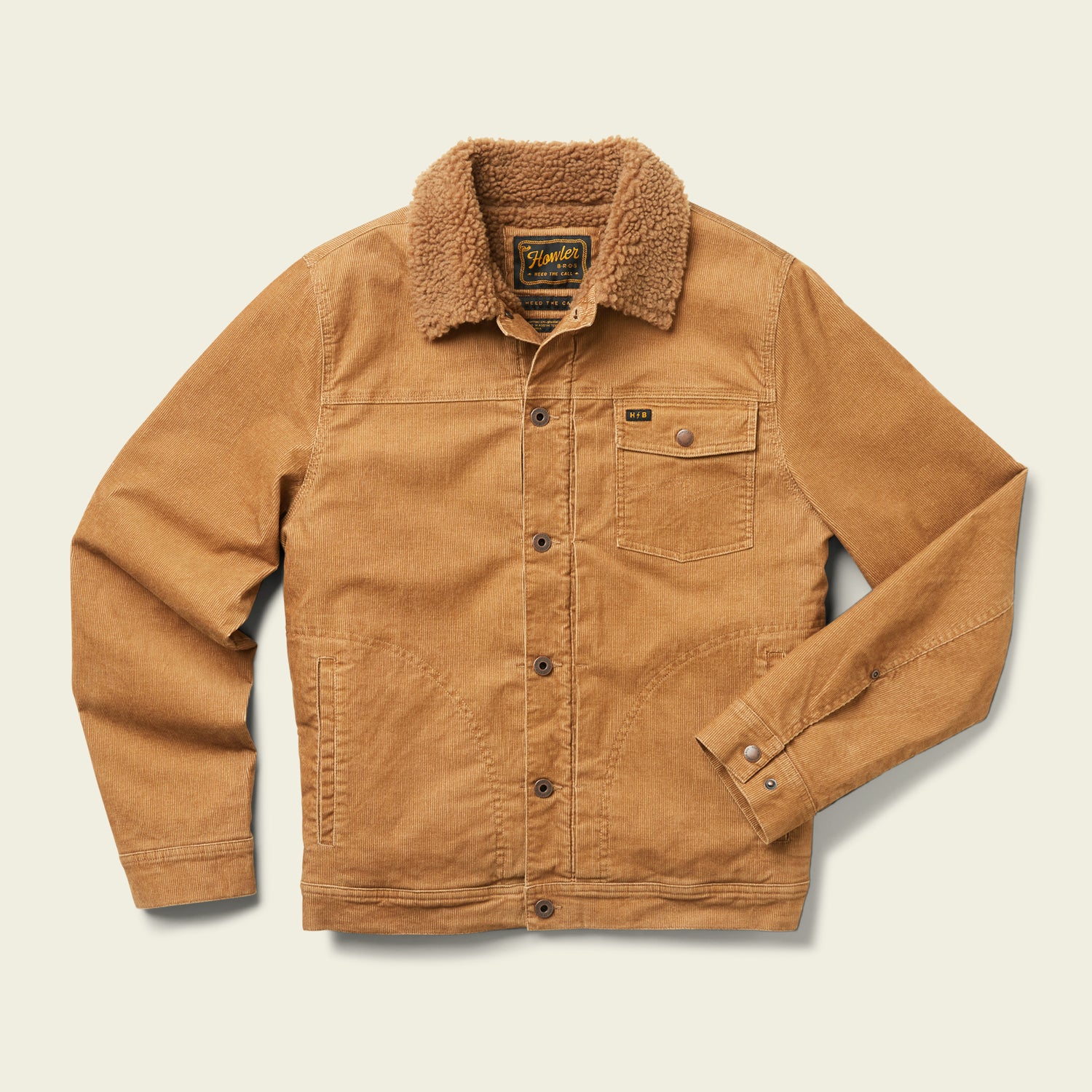 A tan Fuzzy Depot Jacket with a brown sherpa collar, button front, single chest pocket with button, and two side pockets is displayed on a light background.