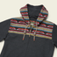 A dark gray cotton blend hoodie with a woven jacquard yoke on the hood and shoulders, showcasing red, yellow, blue, and white designs. Features a zipper front and tan drawstrings with wooden accents.