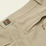 Close-up of beige stretch nylon pants showing a front pocket, belt loops, a drawstring tie, and a green tag with H BROS and PRESTO CHINO printed on it.