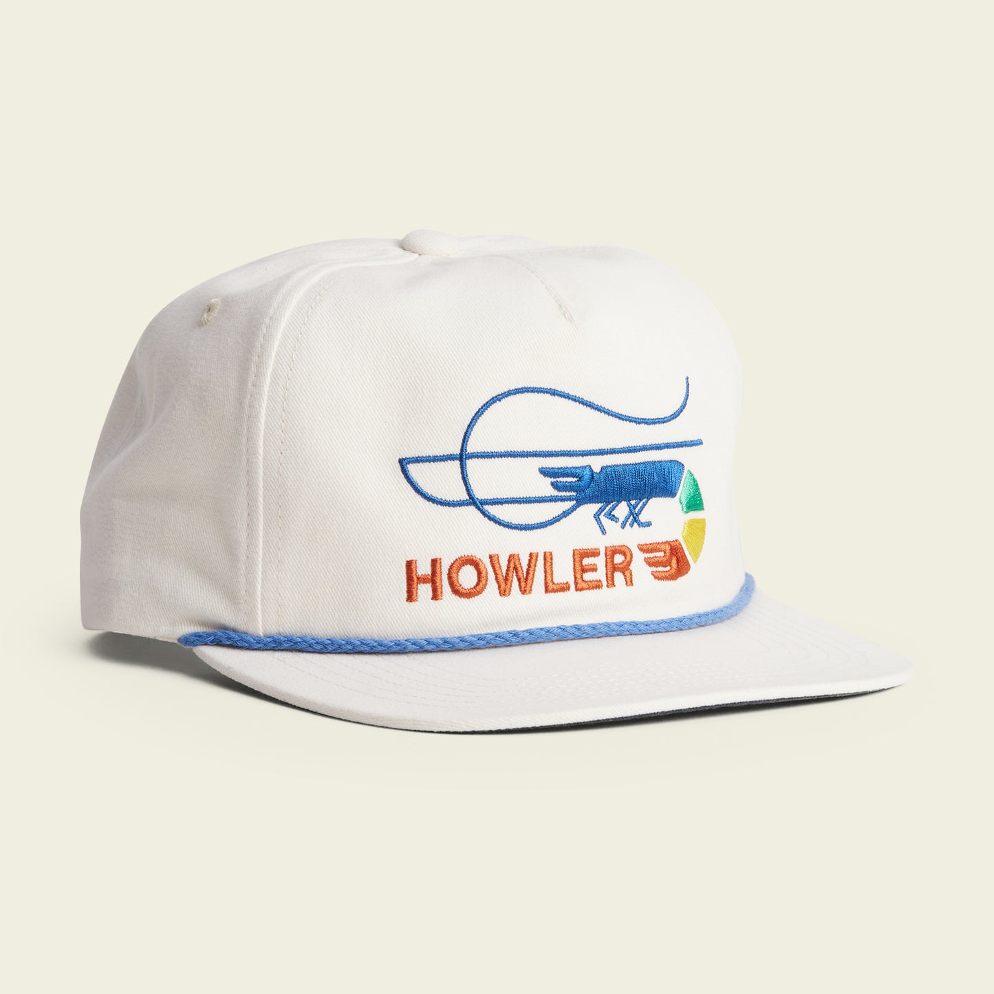 A white unstructured snapback cap with a blue shrimp and colorful geometric design embroidered on the front, plus HOWLER in orange. It features a soft crown, adjustable snapback closure, and a blue accent cord above the brim.