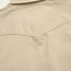 Close-up of the back yoke and collar of a beige Novato Shirt, showing textured canvas fabric and visible stitching details inspired by classic western shirt design.
