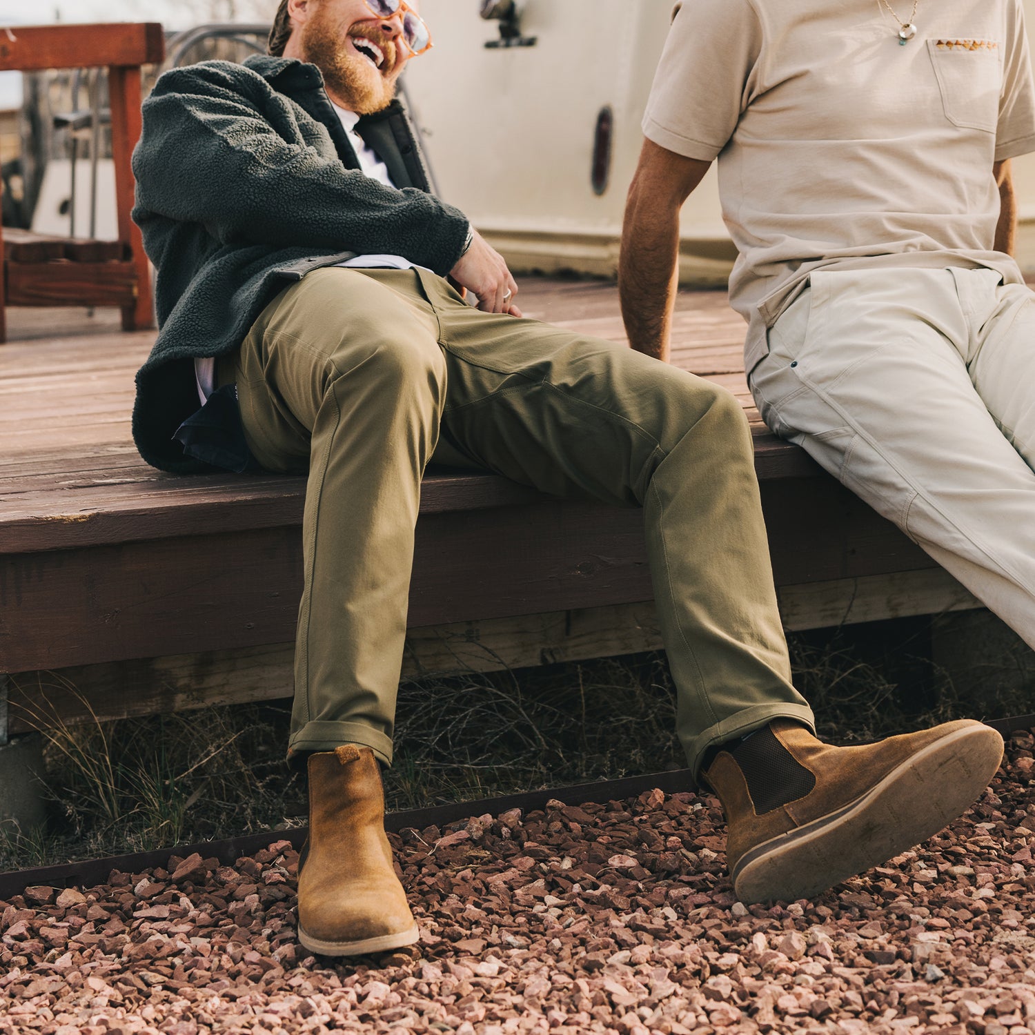 A pair of olive green Frontside Tech Pants laid out flat, showcasing the 5-pocket design.
