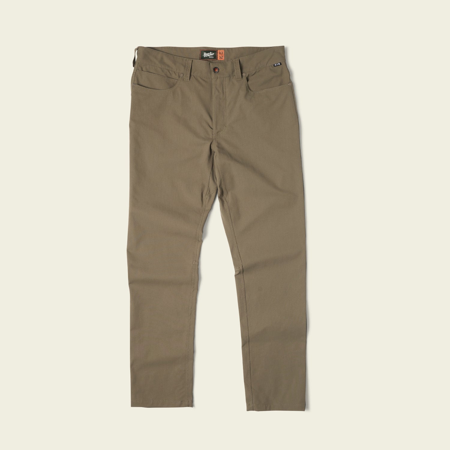 A pair of olive green Frontside Tech Pants laid out flat, showcasing the 5-pocket design.