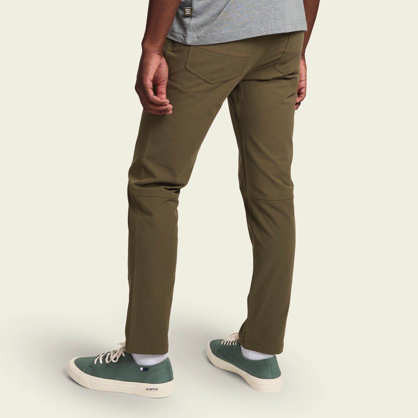 olive green performance tech pants with a classic 5-pocket design