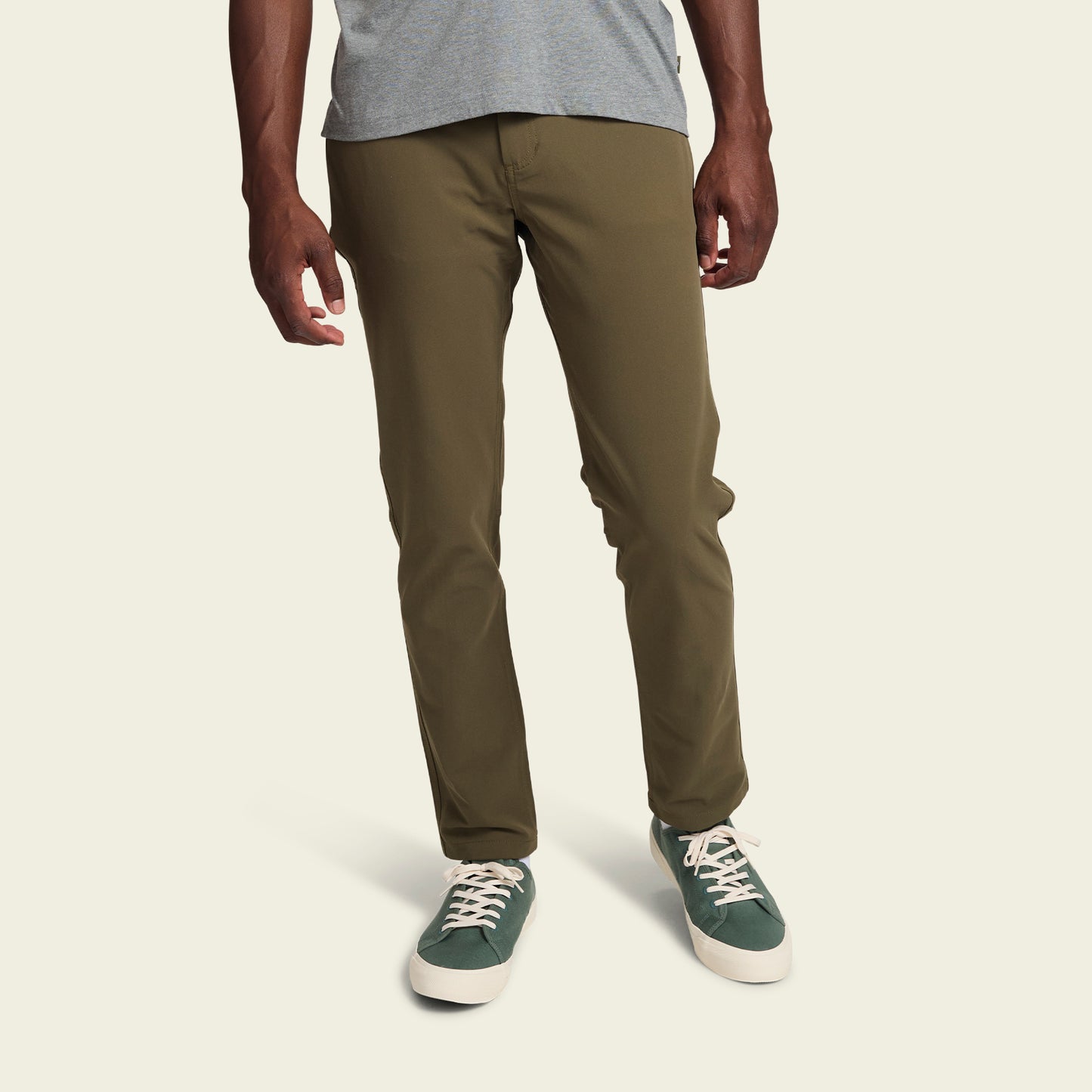 olive green Tech Pants, showcasing the 5-pocket design.