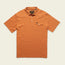 An orange Ranchero Polo, crafted from heathered cotton, features short sleeves, a collar, three buttons, and a button-flap chest pocket with a stitched label—a modern take on a western style polo.