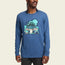 A person wears a blue Howler t-shirt featuring a colorful mushroom graphic with Yousa Brothers text and cartoon characters, all crafted from a soft cotton-poly blend. The person stands against a plain light background.