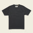 A plain black heavyweight cotton pocket t-shirt with a chest pocket featuring a small patterned strip above it, laid flat on a light background.