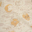 Beige slub fabric with mystical illustrations—moon face, all-seeing eye, skull with castle, stars, and more—in a vintage style reminiscent of classic camp collar shirts.