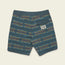 Blue patterned stretchy boardshorts featuring horizontal multicolor geometric designs, a small back pocket with a flap on the right, and a visible white “Jungmaven” brand label below the pocket. The shorts are laid flat on a light background.
