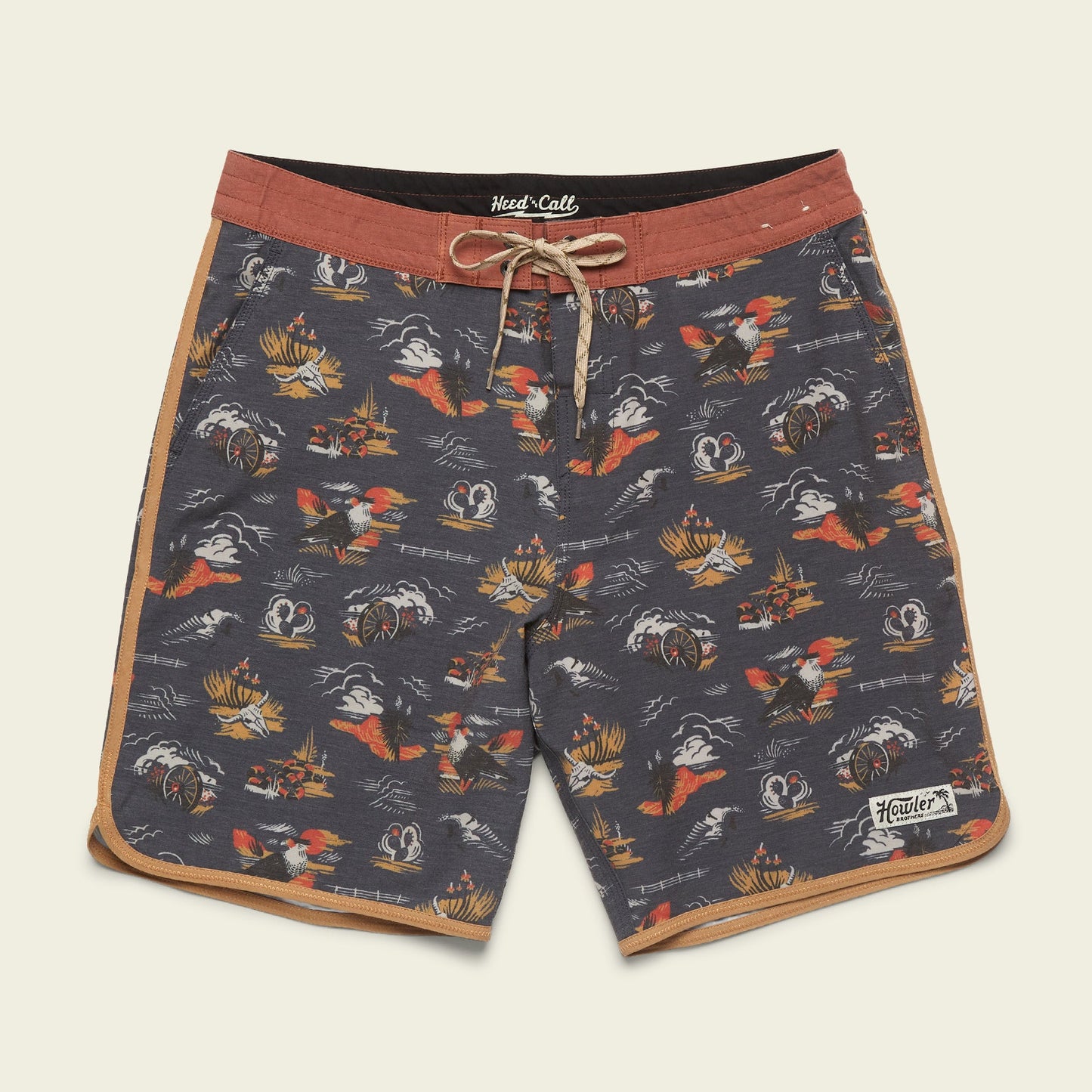 A pair of dark-colored Bruja Boardshorts with a nautical print featuring ships and waves, brown waistband with a front drawstring, tan side trim, stretchy fabric, draining front pockets, and a Howler patch on the left leg.