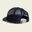 A navy blue, vintage-inspired hat with a mesh back is shown from the rear, featuring an adjustable snap closure and a small tag with a white monkey face logo on the strap.