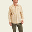 A man wearing a light yellow plaid lightweight stretch shirt with long sleeves and olive green pants stands against a plain, light background.