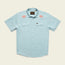 Light blue Crosscut Deluxe Shortsleeve summer shirt with two chest pockets; features pink motif embroidery of palm trees on both shoulders. Shirt is laid flat on a neutral background.