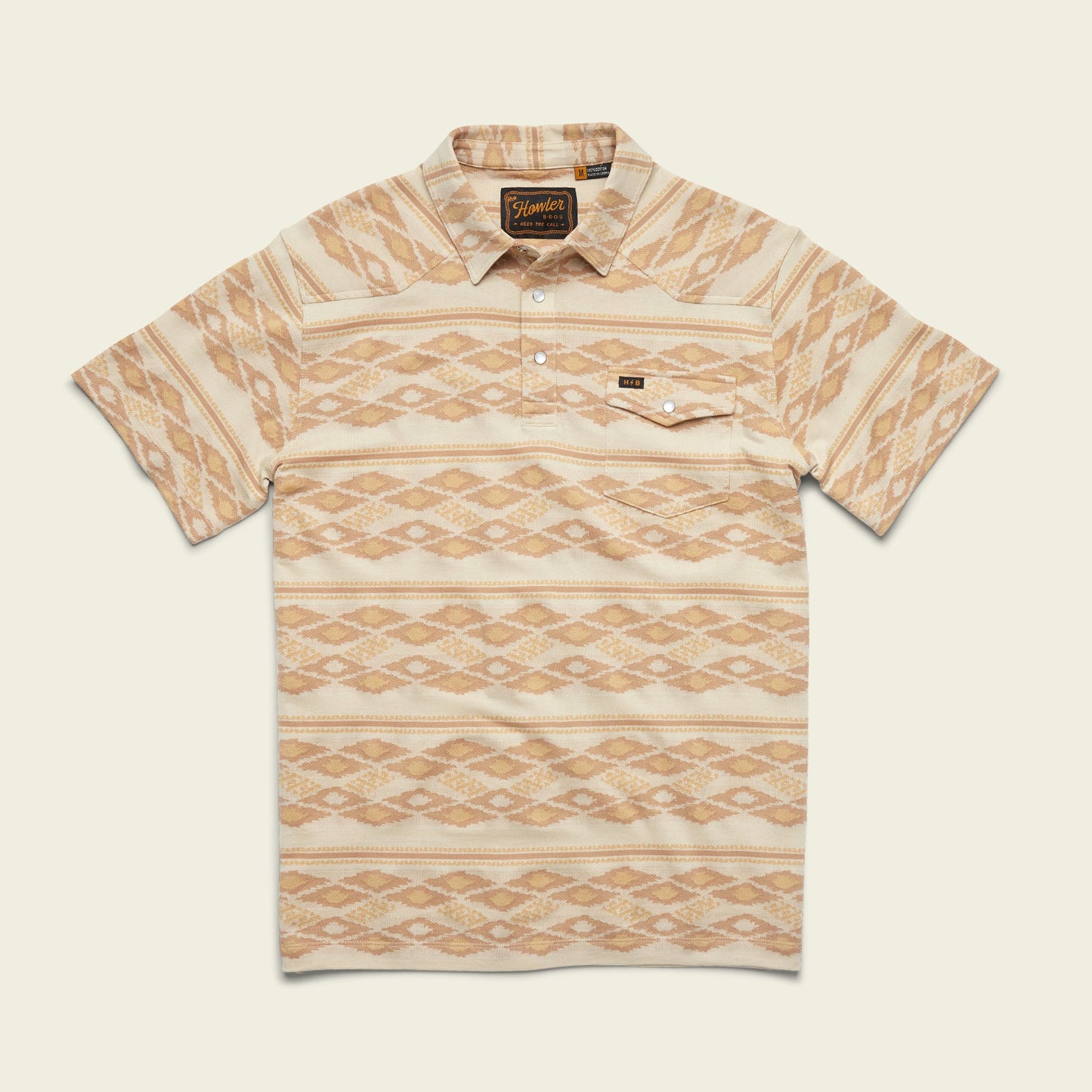 Short-sleeve collared Ranchero Jacquard Polo with a beige and light brown geometric diamond pattern, buttoned placket, and single chest pocket, crafted from 100% cotton jacquard, displayed on a light background.