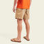 A person wearing a bright orange t-shirt, Westside Day Shorts with geometric embroidery, and brown sandals stands facing away from the camera against a plain, light-colored background.