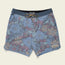 Blue floral-patterned Bruja Boardshorts for men, featuring stretchy fabric, a drawstring waist, draining front pockets, and a Howler Bros patch on the bottom left leg, laid flat on a light background.