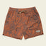 Orange swim shorts with a dark tropical leaf pattern, featuring a 7” inseam, elastic waistband with beige drawstring, and a small rectangular “Howler” patch sewn near the hem on the left leg.