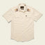Short-sleeve, cream-colored Crosscut Deluxe Shortsleeve western shirt with white snap buttons, two front pockets, and floral motif embroidery in brown, yellow, and cream above the chest—a perfect summer shirt.