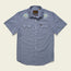 The Crosscut Deluxe Shortsleeve Shirt - Fresh Blooms: Indigo is a light blue summer shirt with two chest pockets, white buttons, and colorful seashell motif embroidery on the shoulders.