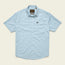 Light blue H Bar B Snapshirt with short sleeves, subtle white polka dot pattern, pearl snap buttons, two chest pockets with button flaps, and a small black logo tag above the left pocket. Shirt is laid flat on a plain background.