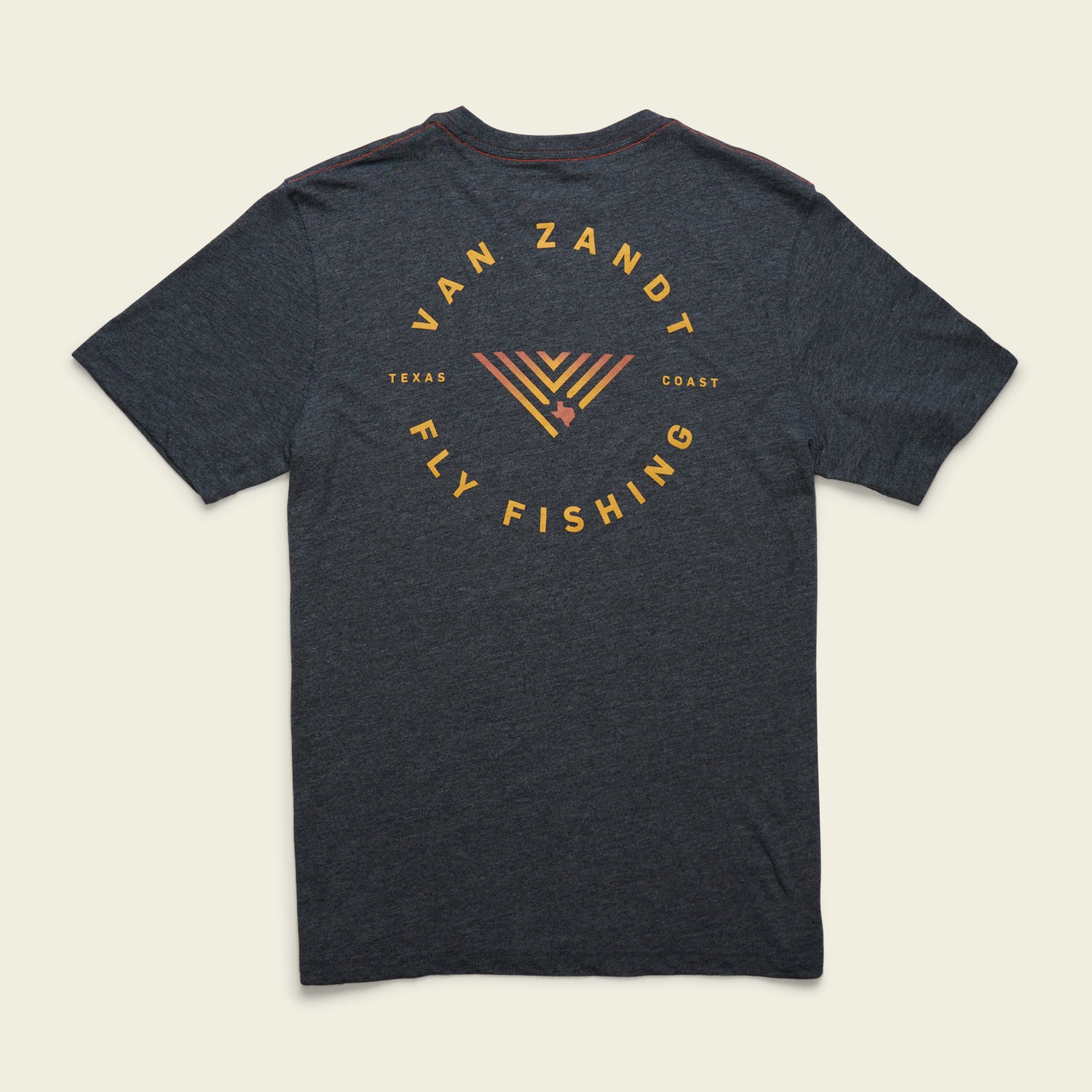 Dark gray Howler Select T-Shirt from the JT Van Zandt Collection, featuring orange and yellow text reading Van Zandt Fly Fishing and Texas Coast around a fish hook graphic forming the letter V on the back.