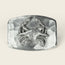 A rectangular, sterling silver buckle from Cityboy Forge features a raised, detailed crab design at its center and a hammered metal texture in the background.