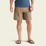 A person wearing a blue t-shirt and versatile shorts made from ripstop fabric with brown flip-flops stands facing forward. Only their body from the shoulders down is visible against a plain light background.