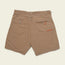 Tan Horizon Hybrid Shorts viewed from the back, featuring a flap pocket with snap closure on the left, a zippered pocket with an orange pull on the right, and belt loops along the waistband. Made from durable ripstop fabric for versatile wear.