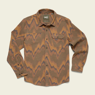 A long-sleeve button-up Harkers Flannel shirt with a brown, tan, and dark wavy zigzag pattern, featuring reinforced elbow patches and a left chest pocket with a flap and button, displayed on a light background.