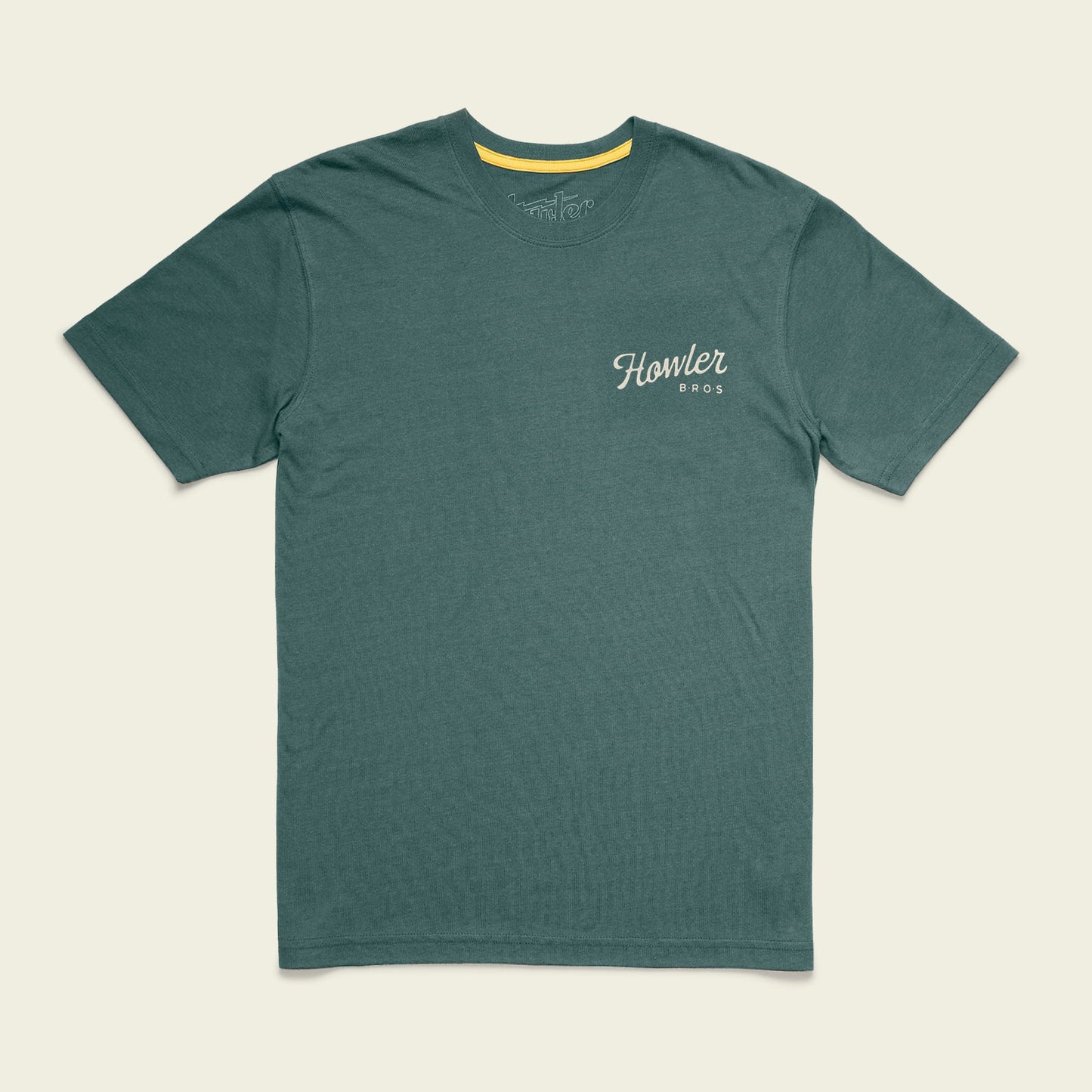 A green short-sleeve Howler blended t-shirt with white script on the left chest, crafted from a soft cotton-poly blend for maximum comfort, displayed flat on a light background.